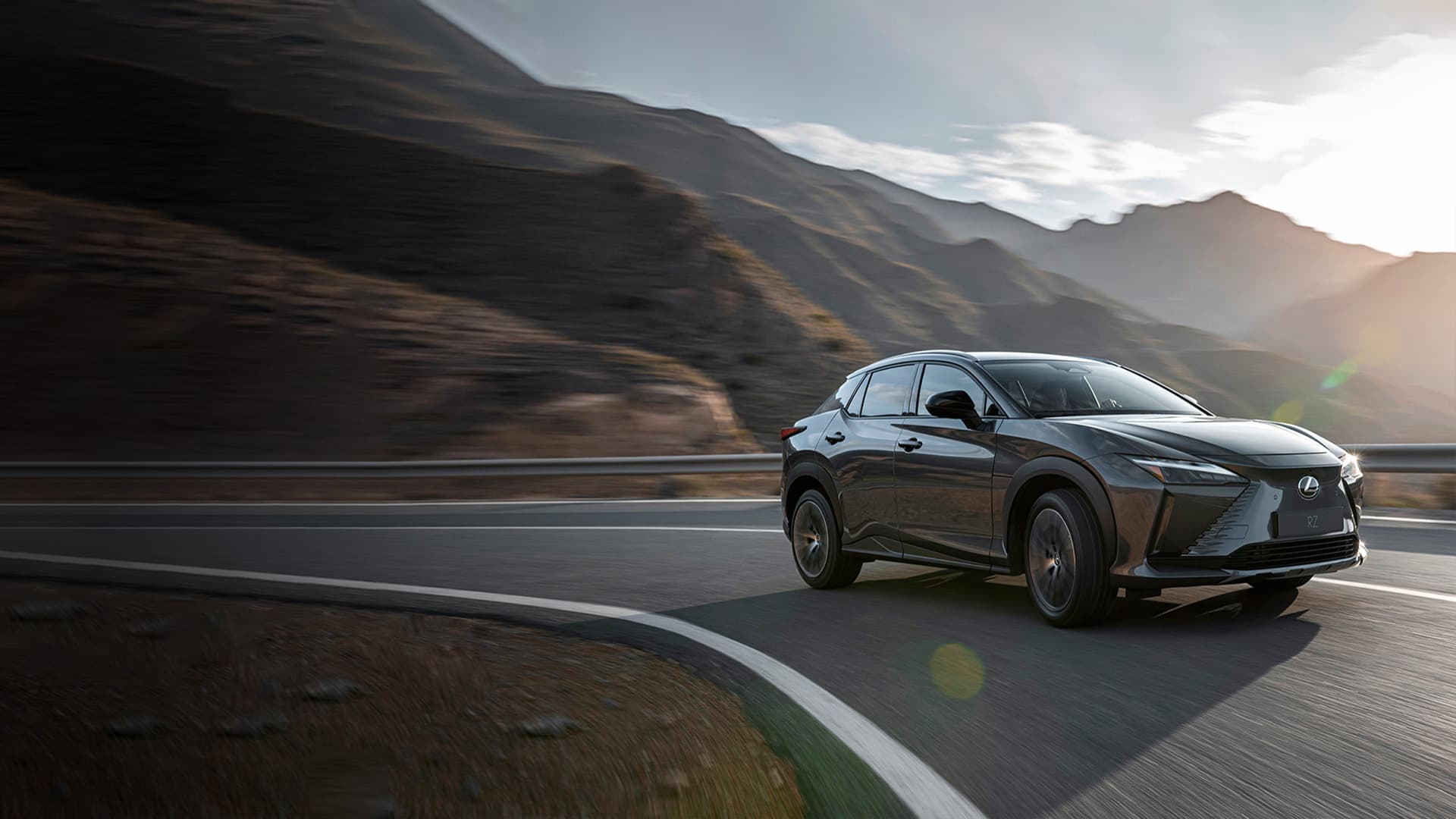 Grey RZ cruising along a road